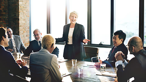 Multiracial business professionals at a conference table