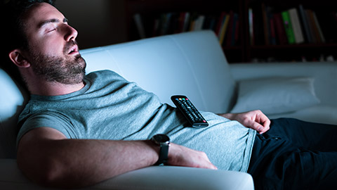 lazy man sleeping on a couch