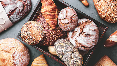 various types of bread in a basket