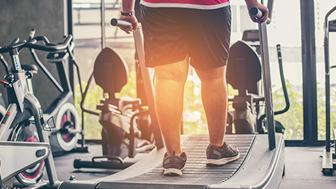 overweight person on a treadmill