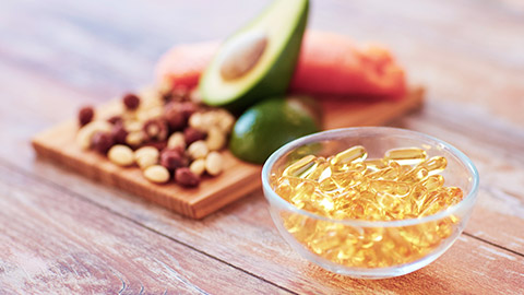 supplements on a table in front of food