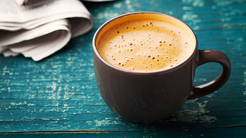 Cup of coffee sitting on a table