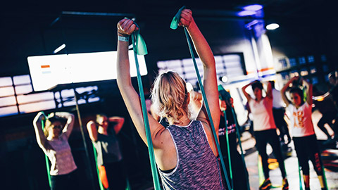 woman leading fitness class