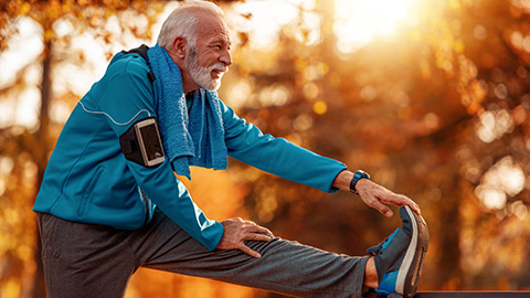 senior man about to exercise outdoors