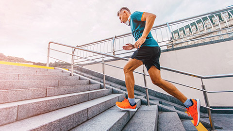 Man running up stairs