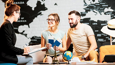 young couple in a travel agent