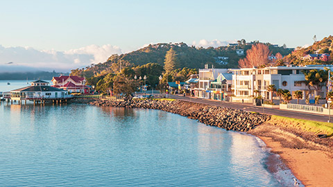 small coastal town at sunrise