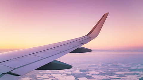 aircraft wingview at sunset