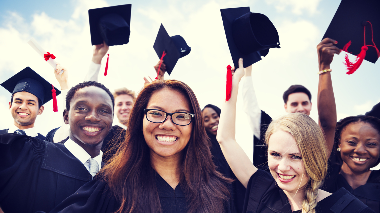 Group of Diverse International Graduating Students Celebrating