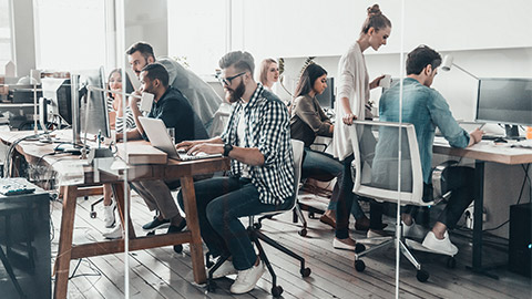 A group of people working in an office space