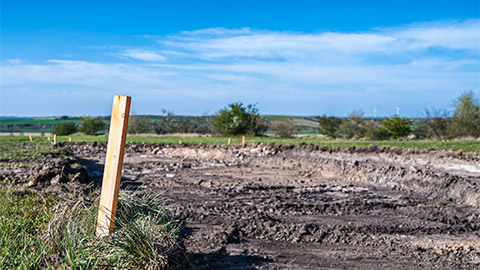 An empty building site in a rural area